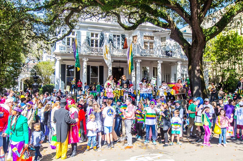 people standing out the front of a New Orleans home in the Garden District 