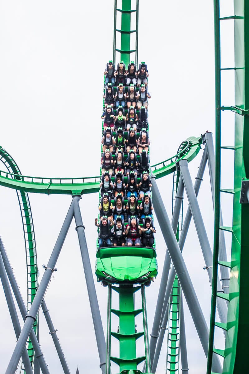 people on the hulk roller coaster taking a dip