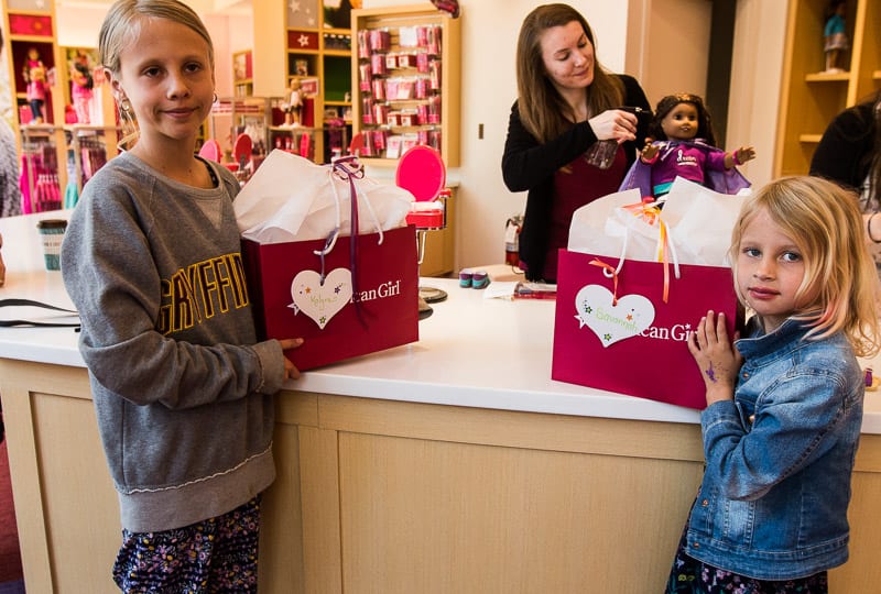 girls buying dolls at American Girl Doll Store, Mall of America