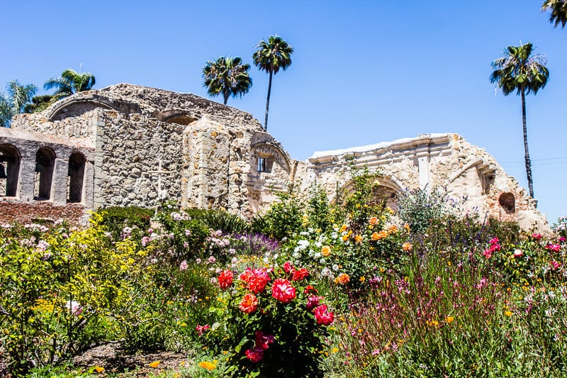 palm trees and gardens inside the Mission San Juan Capistrano, Orange County, California