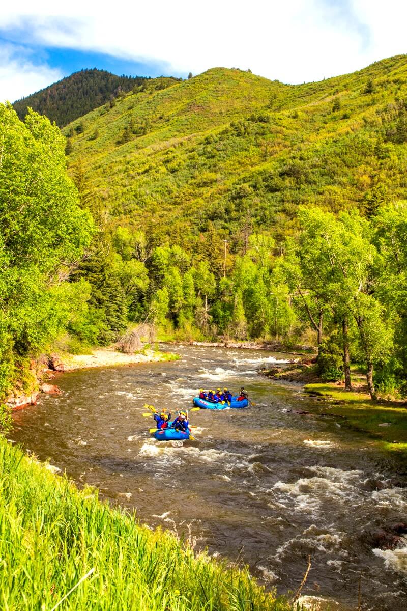 people white water rafting on colorado river