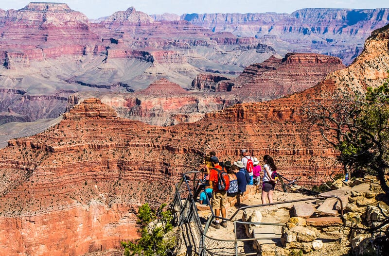 people looking at grand canyon view