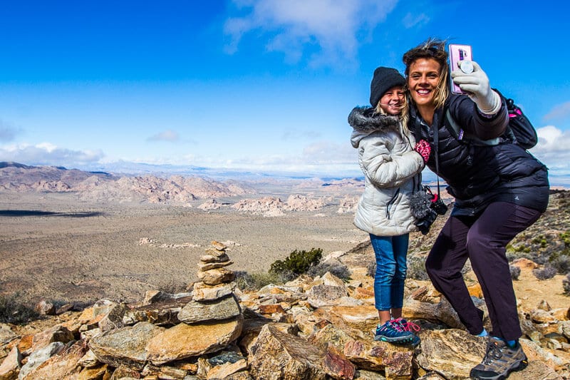 woman and girl taking selfie on top of Ryan Mountain 