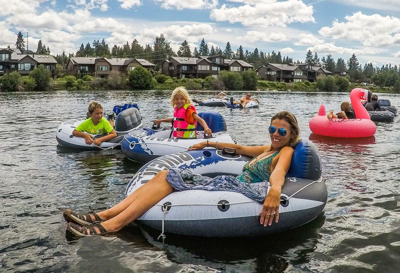 woman and miss  stream  Tubing successful  Bend, Oregon
