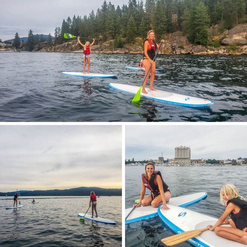 woman and girls paddlboarding connected  Lake Coeur D'alene