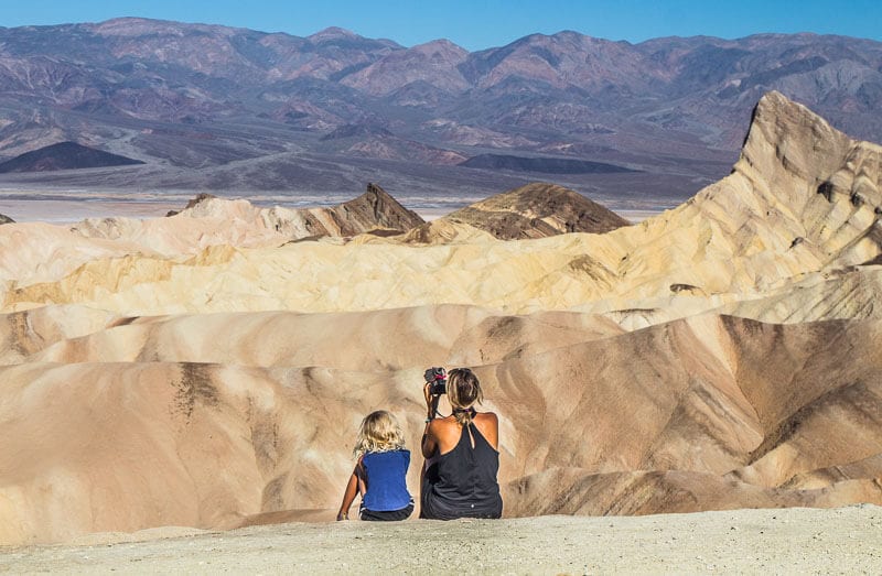 woman and child looking at view of Zabriskie Point