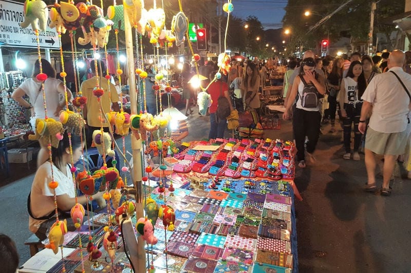 people shopping at the Sunday Walking Street Market Chiang Mai