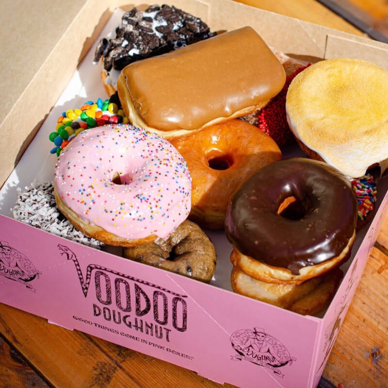 A box filled with different kinds of donuts