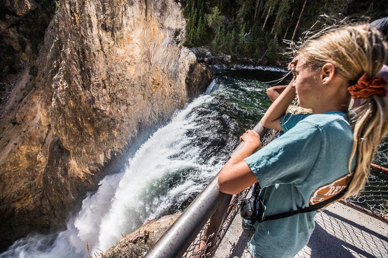 girl looking at a waterfall
