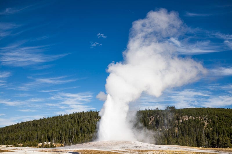 Old Faithful geyser sprouting water, Yellowstone