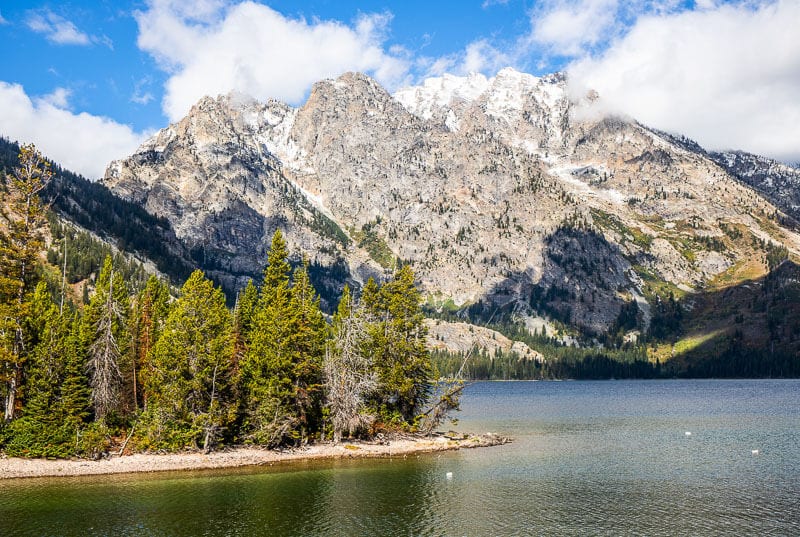 Jenny Lake with snow capped mountains in the background