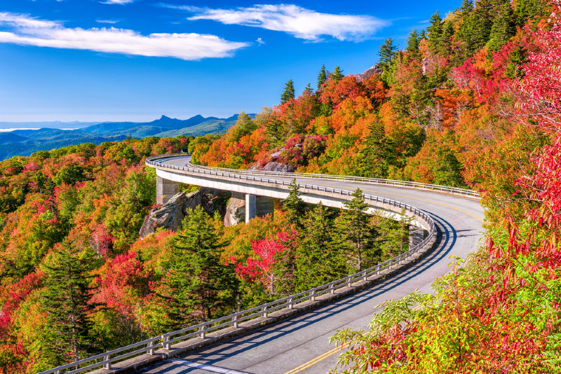 Linn Cove Viaduct flanked by bright fall foliage
