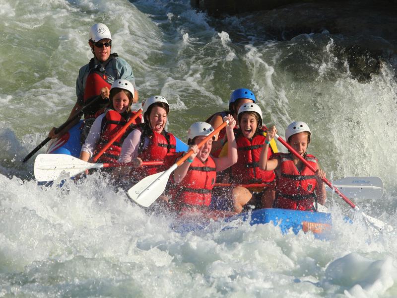 people in whitewater raft