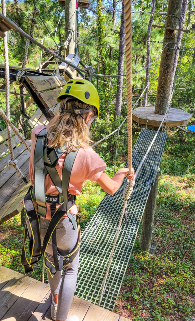 girl doing a ropes course