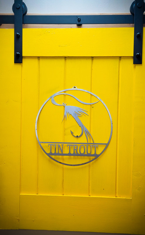 tin trout yellow sign