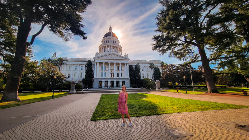 caroline standing in front of the California State Capitol
