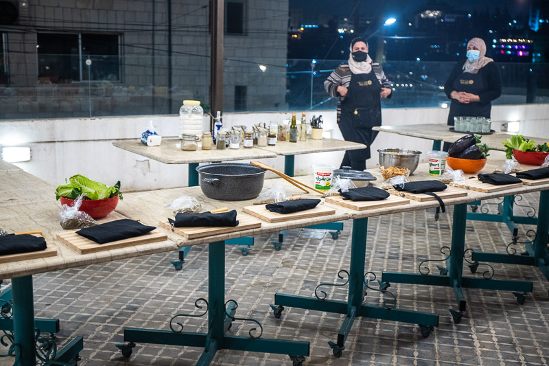 cooking stations set up on a terrace