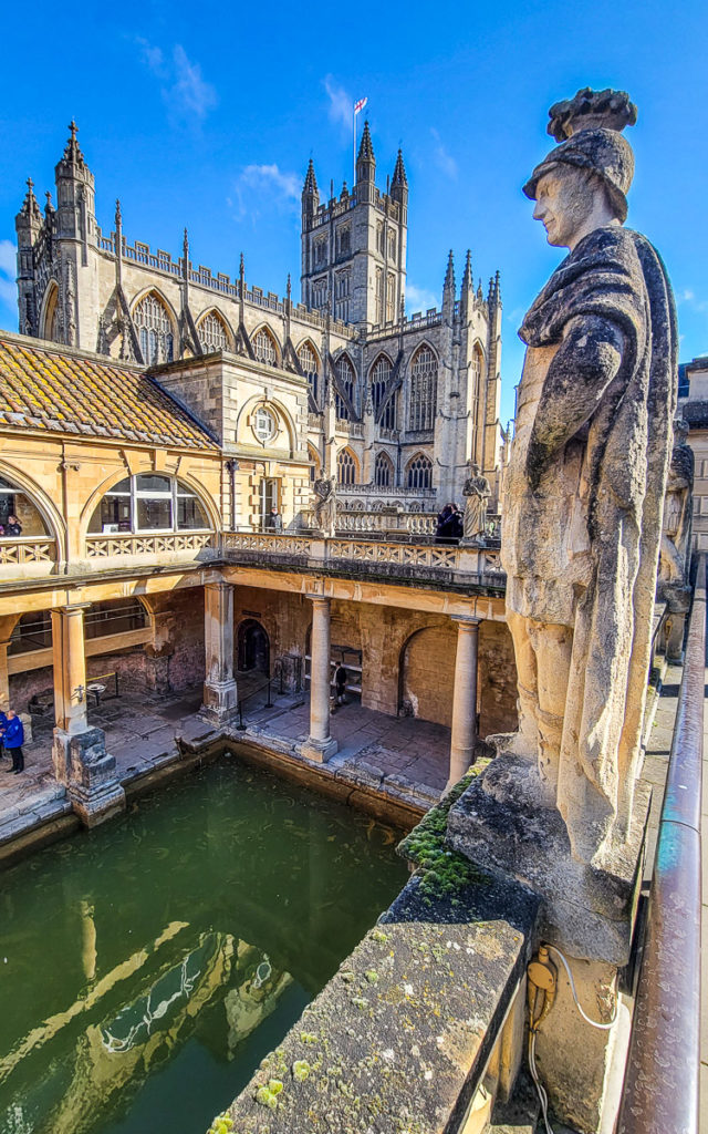 roman bath with an old building in the background