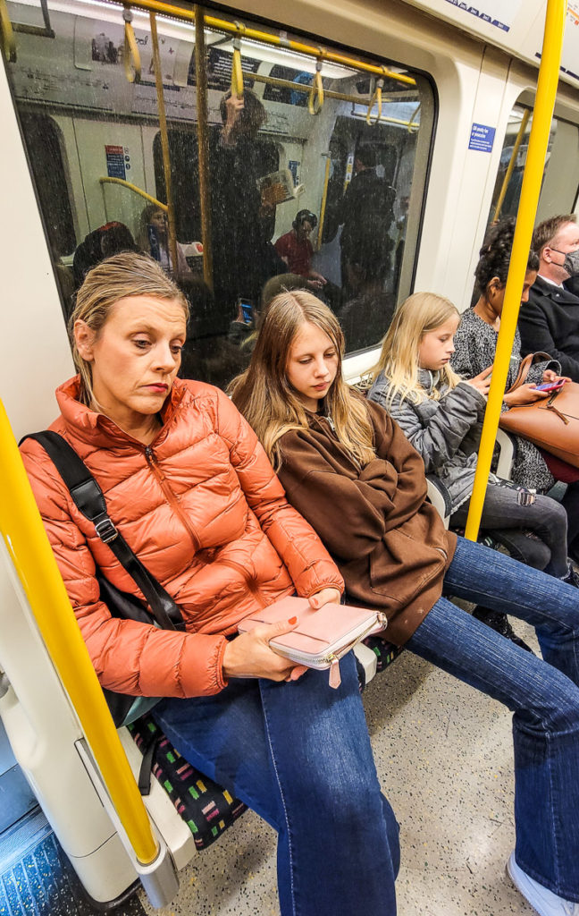 people sitting on the tube