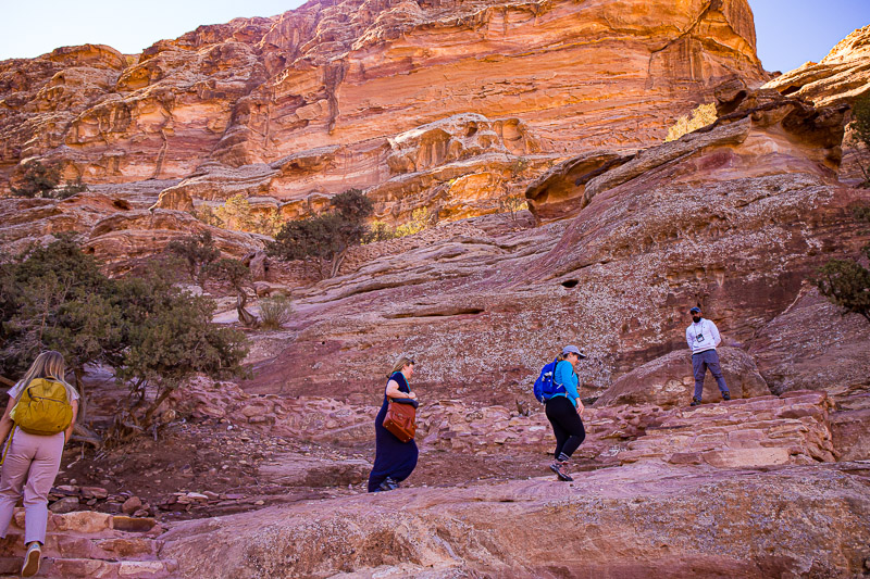 A group of people in a canyon