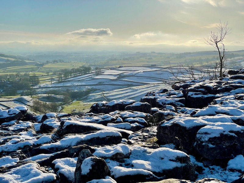 snow covered rocks and valleys in the Yorkshire Dales UK