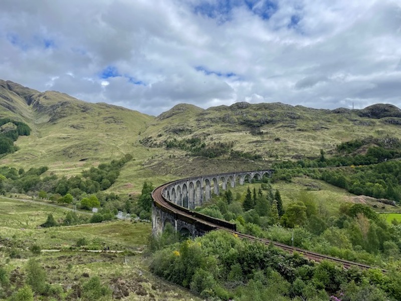 Harry Potter Railway viaduct going through Glenfinnan in the Scottish Highlands