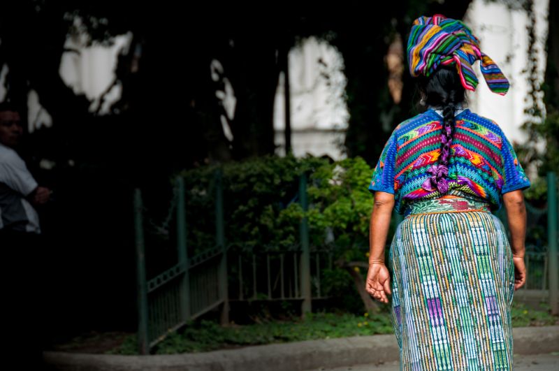 indigenous woman in Guatemala wearing colortful clothes