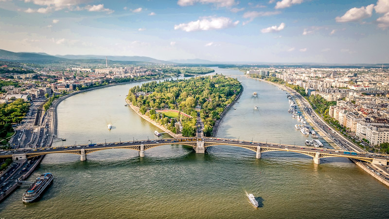 Aerial photo of Margaret Island in the middle of the Danube River and the Margaret Bridge 