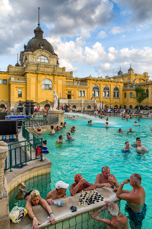 people in the swimming pool Szechenyi thermal bath in Budapest, Hungary