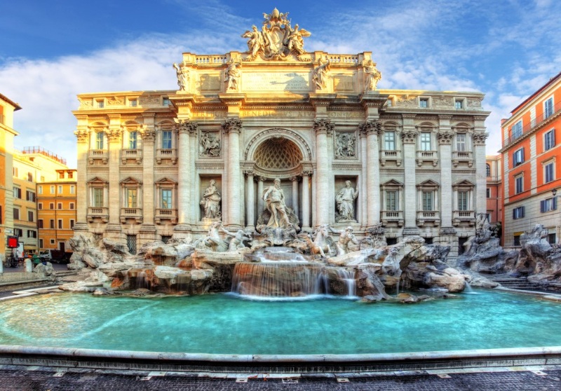 stunning Roman building with trevi fountain in front