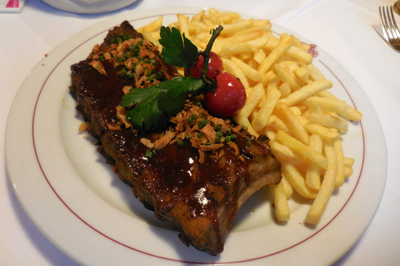 plate of spareribs with fries
