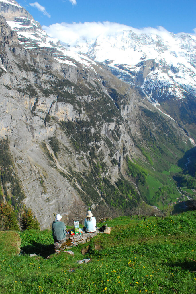 two people admiring the view of lauterburnnen valley