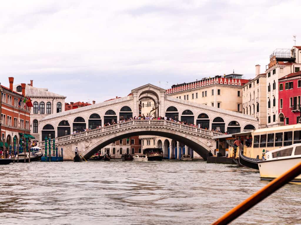 looking at rialto bridge from the water