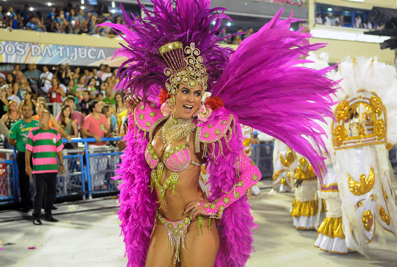 woman in elaborate pink feathered and sequenced Carnival costume