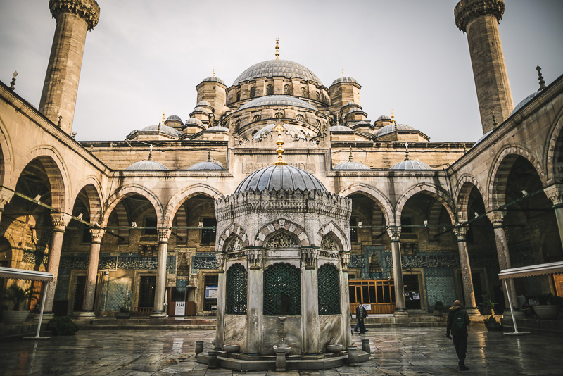 elaborate arched courtyard of Suleymaniye mosque in Istanbul, Turkey