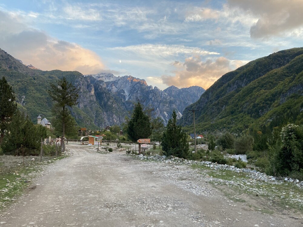 gravel path through the mountain valley in Theth