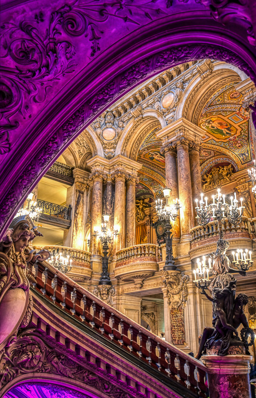 elaborate expansive  staircase  and marble interior with golden  leafage   painted ceilings successful  the Palais Garnier