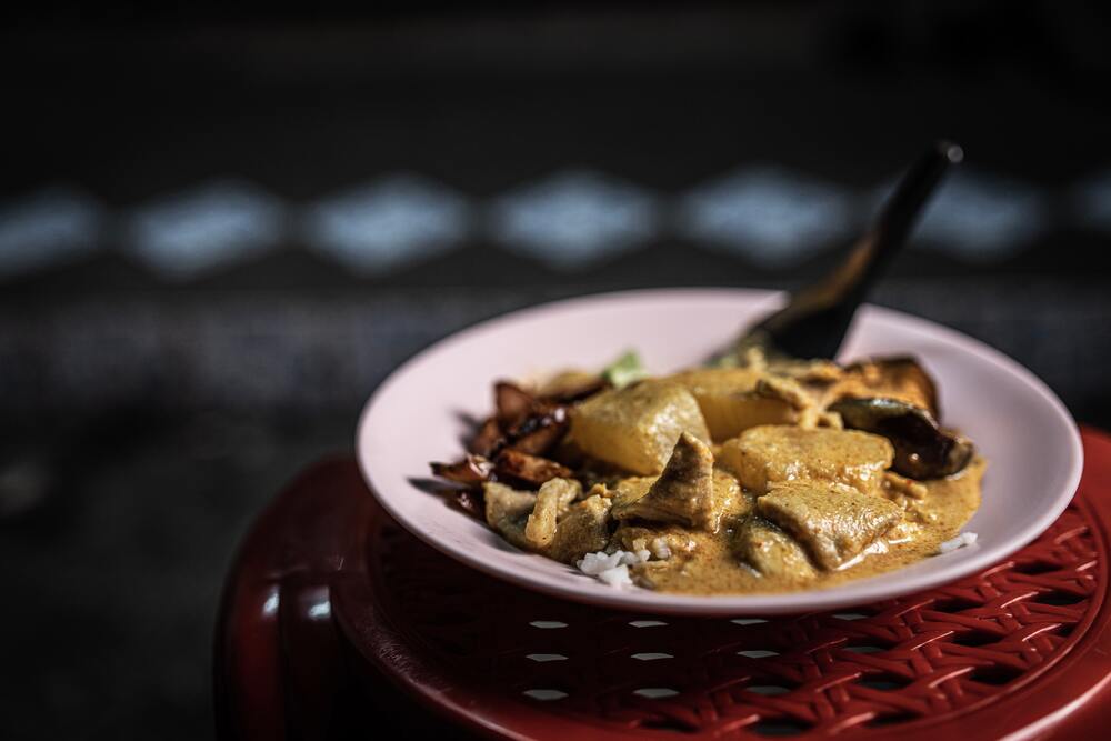 bowl of thai curry on table