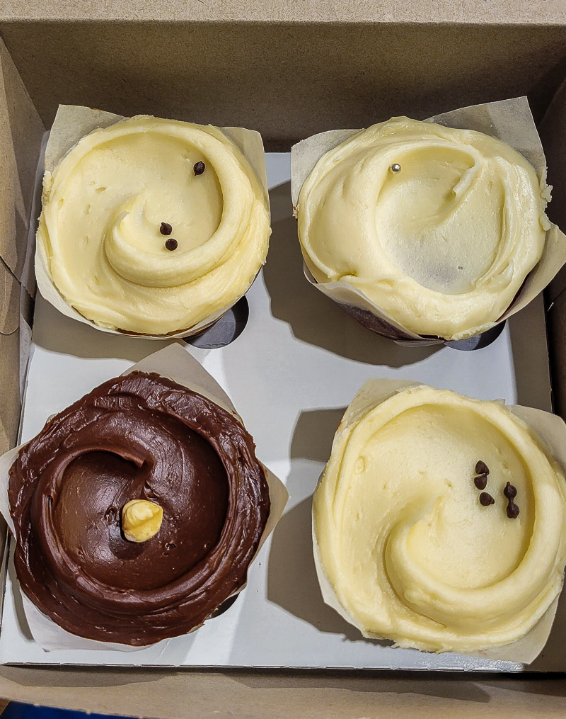 Four cupcakes in a box