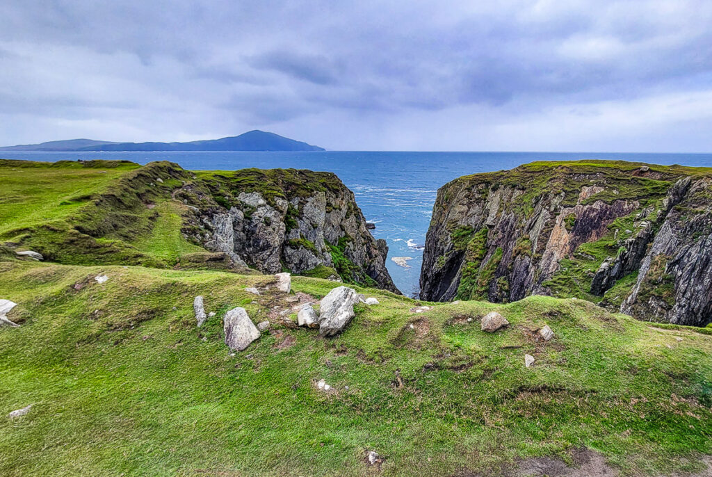 A rugged coastline with a gorge and blue ocean