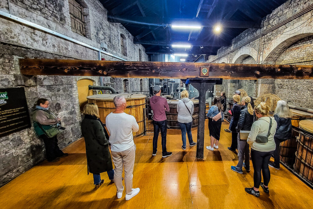 People standing around a room on a Whiskey tour