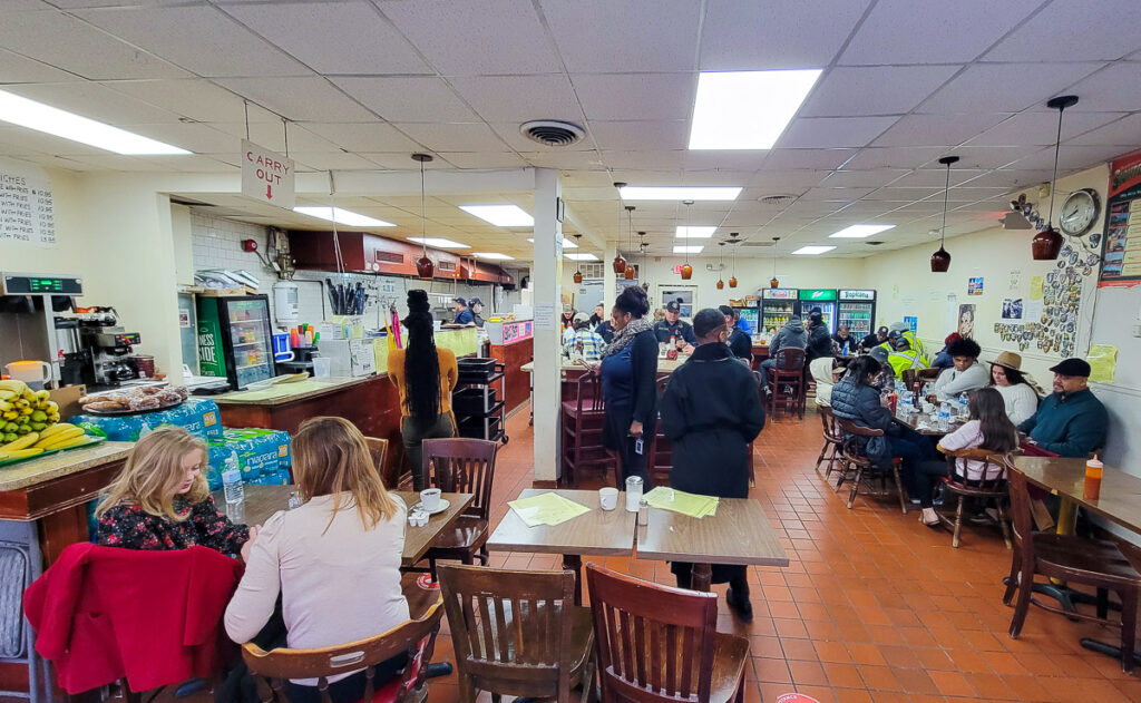 People having breakfast in a diner