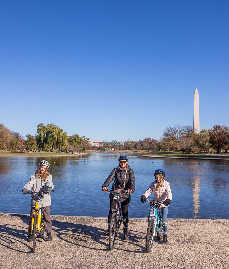 Mom and two daughters riding bikes in Washington DC