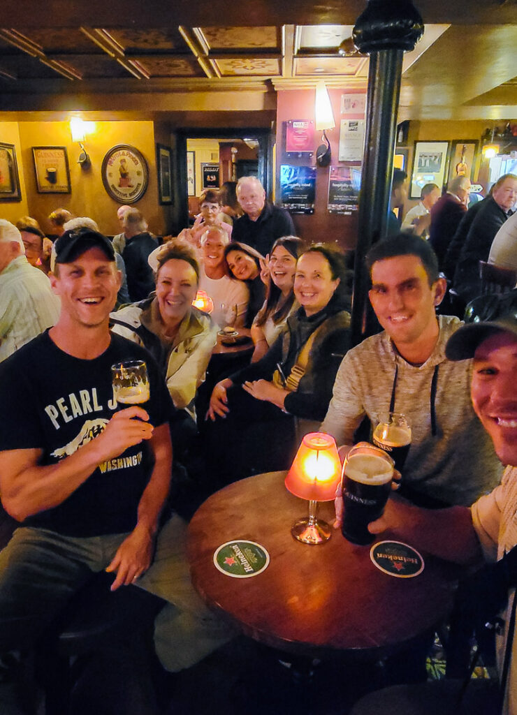 Group of friends drinking in an Irish pub