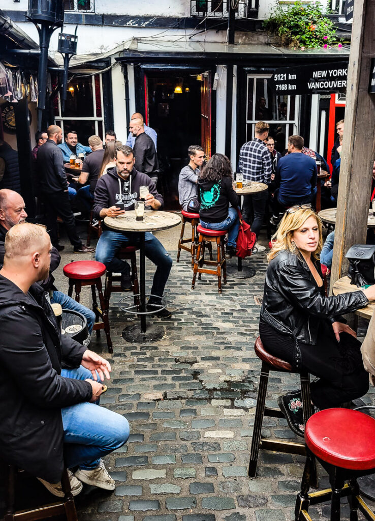 People sitting in a beer garden at a pub
