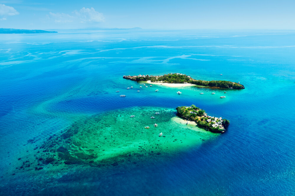 aerial view of crocodile and magic islands with reefs