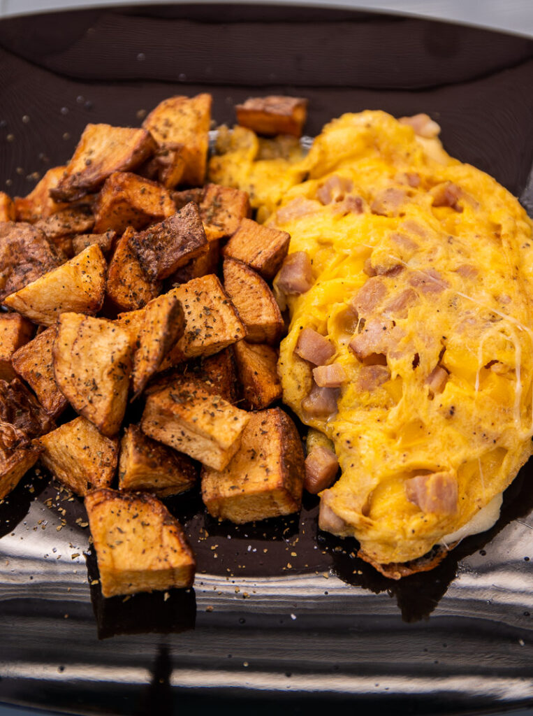 Omelet with ham and breakfast potatoes