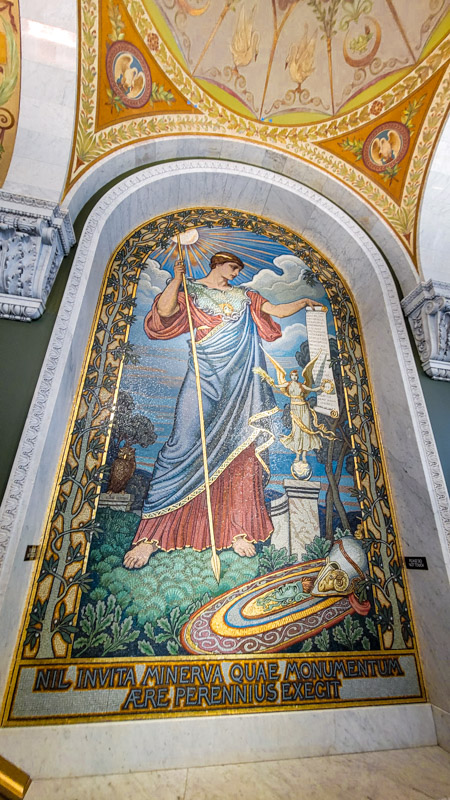 colorful mosaic on wall of minerva