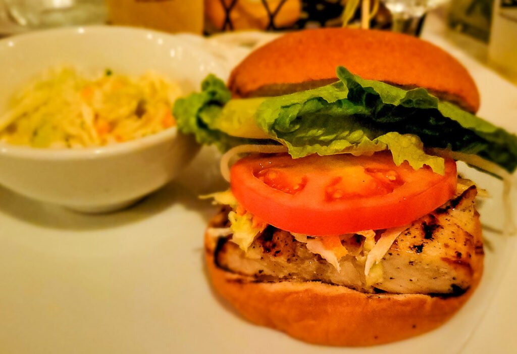Burger on a plate with coleslaw