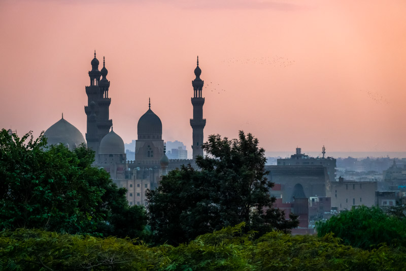 The two mosques Al-Rifa'i and Sultan Hassan at sunset in Cairo Egypt